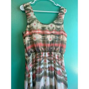 As U Wish tulip hem sundress. Peach and green on cream.